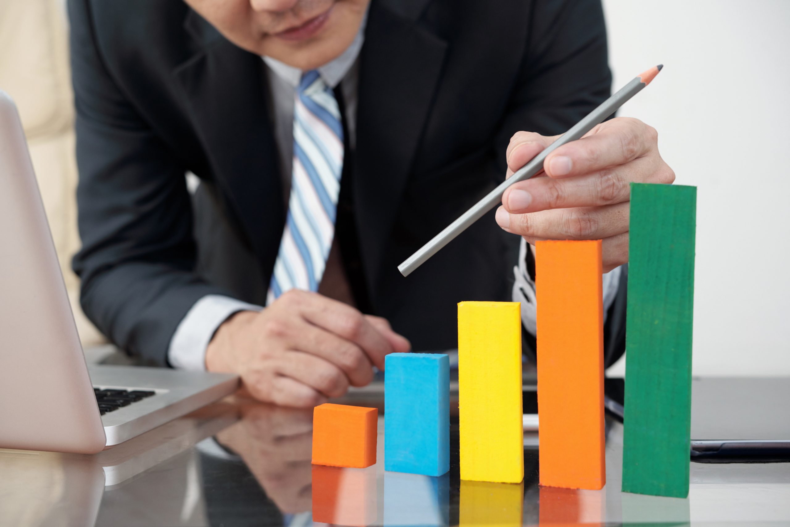 Financial manager showing increasing sales