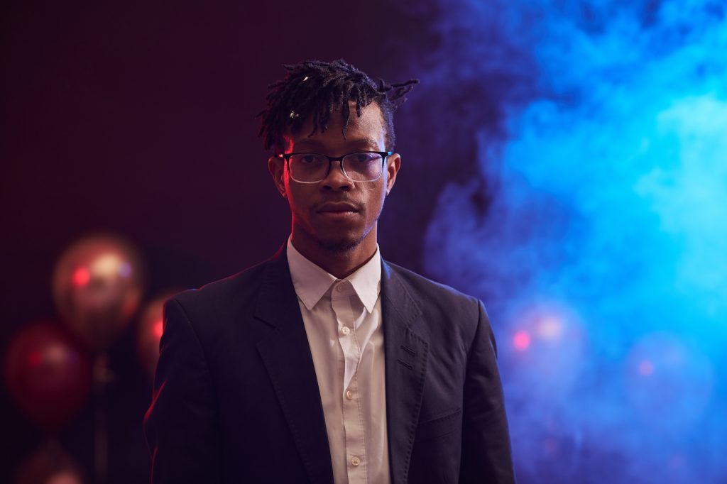 Handsome African Man Posing at Nightclub Party