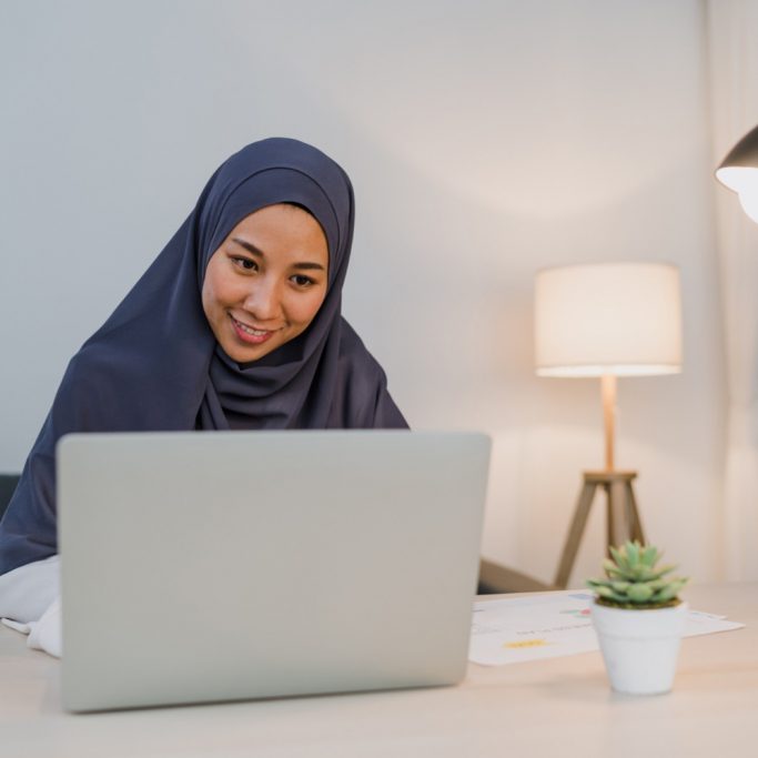 beautiful-asia-muslim-lady-headscarf-casual-wear-using-laptop-living-room-night-house